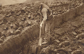 Man Cutting Turf