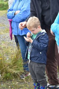 Boy with Magnifying Glass