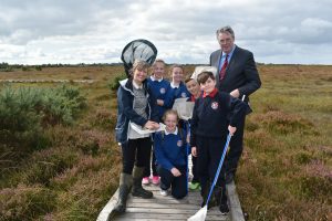 Ciaran Mullooly with school children from Scoil Bhride and Scoil Phroinsias Naofa