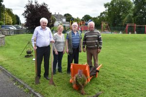 People with Peat Cutting Tools and Barrow