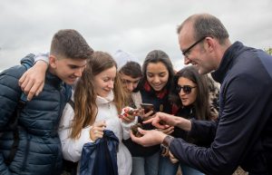 Students photographing a piece of bog